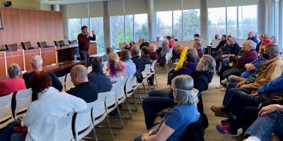 Brad at a congress on your corner town hall
