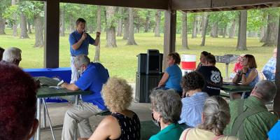 Above: Congressman Brad Schneider (IL 10) answers questions from constituents at “Congress On Your Corner” in Zion
