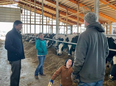 Brad speaking with farmer.