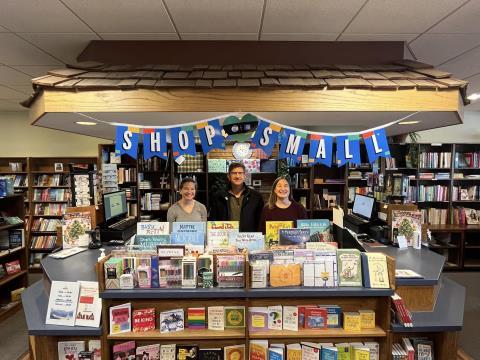 Brad standing in a bookstore 