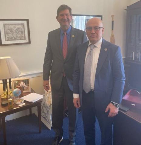 Schneider and Meeting Attendee 