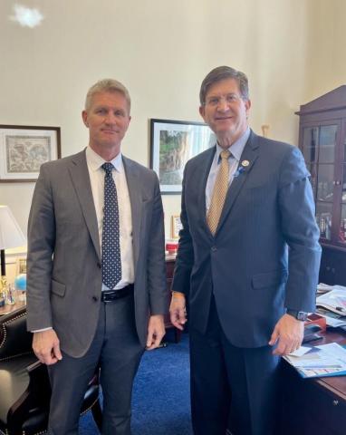 Schneider and Meeting Attendee 