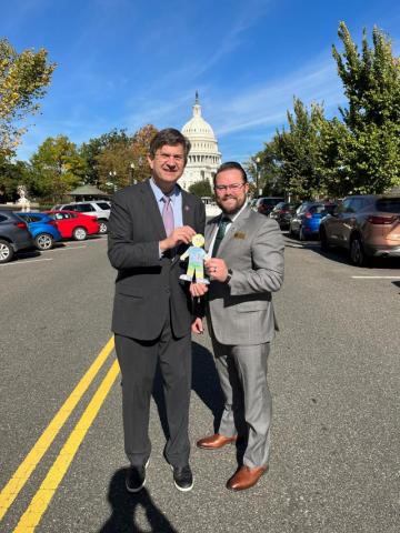 Schneider and Meeting Attendee 