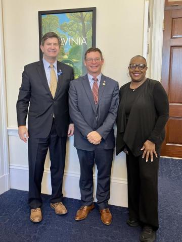 Schneider and Meeting Attendee 