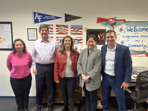 Congressman Schneider & North Suburban Legal Aid Pose for a Photo