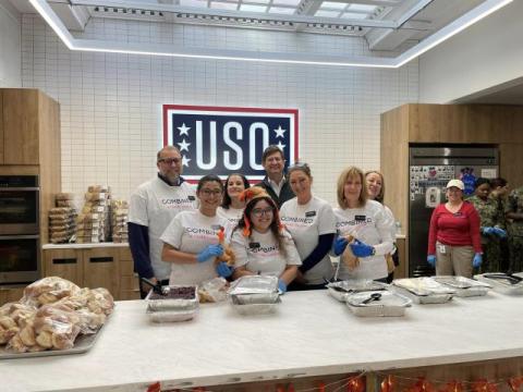 Congressman Schneider Serving Meals at the USO