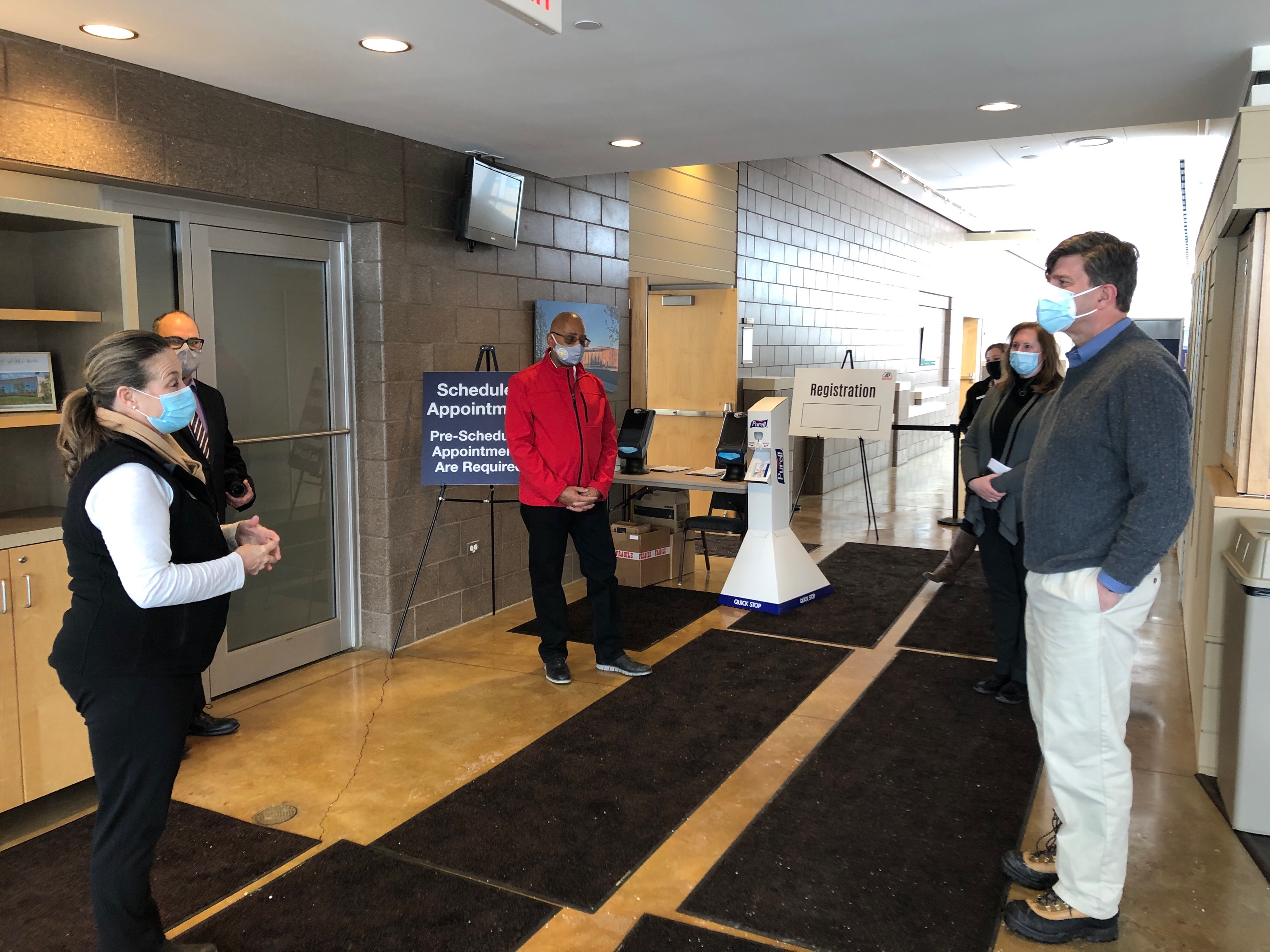 Congressman Schneider meets with officials and volunteers running the North Chicago Vaccination Site