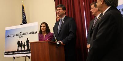 Rep. Schneider at podium