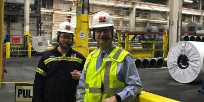 Above: Congressman Brad Schneider tours Novelis, a Lincolnshire  based manufacturing plant, with Plant Manager Blake Hunter